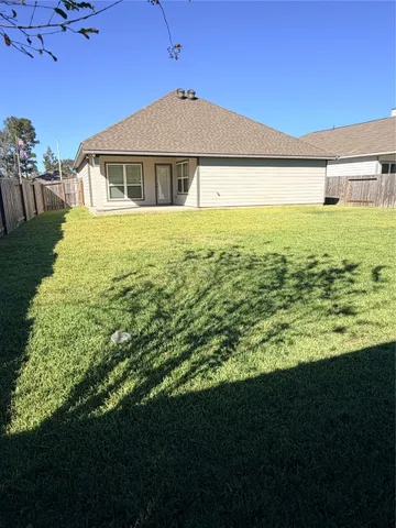 a view of a house with a garden