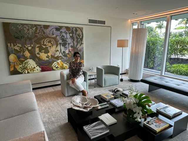 a view of kitchen with stainless steel appliances kitchen island sink and refrigerator