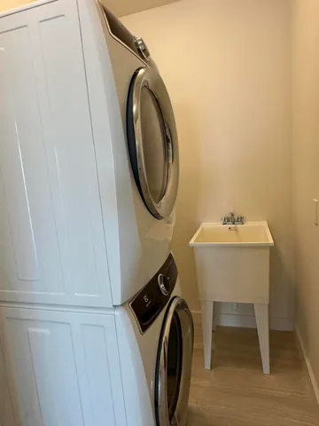 an empty room with closet and bathroom