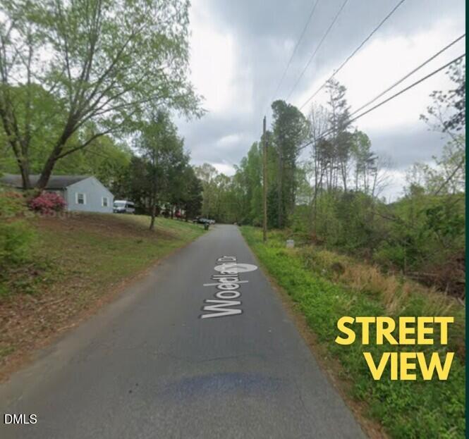 0 Woodland Drive Rutherfordton, NC 28139 - Photo 4 of 5 a view of a street with a yard