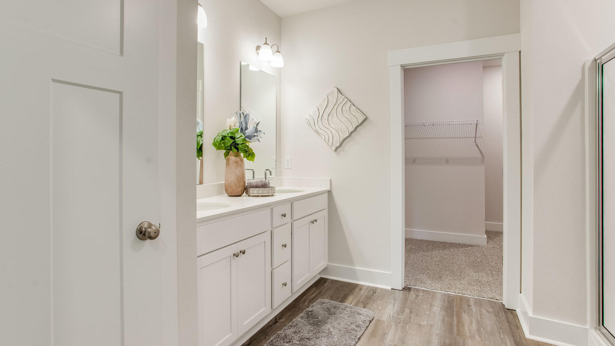 34 Foxtrail Run Freeport, FL 32439 - Photo 19 of 31 a bathroom with double vanity sink a mirror and a shower