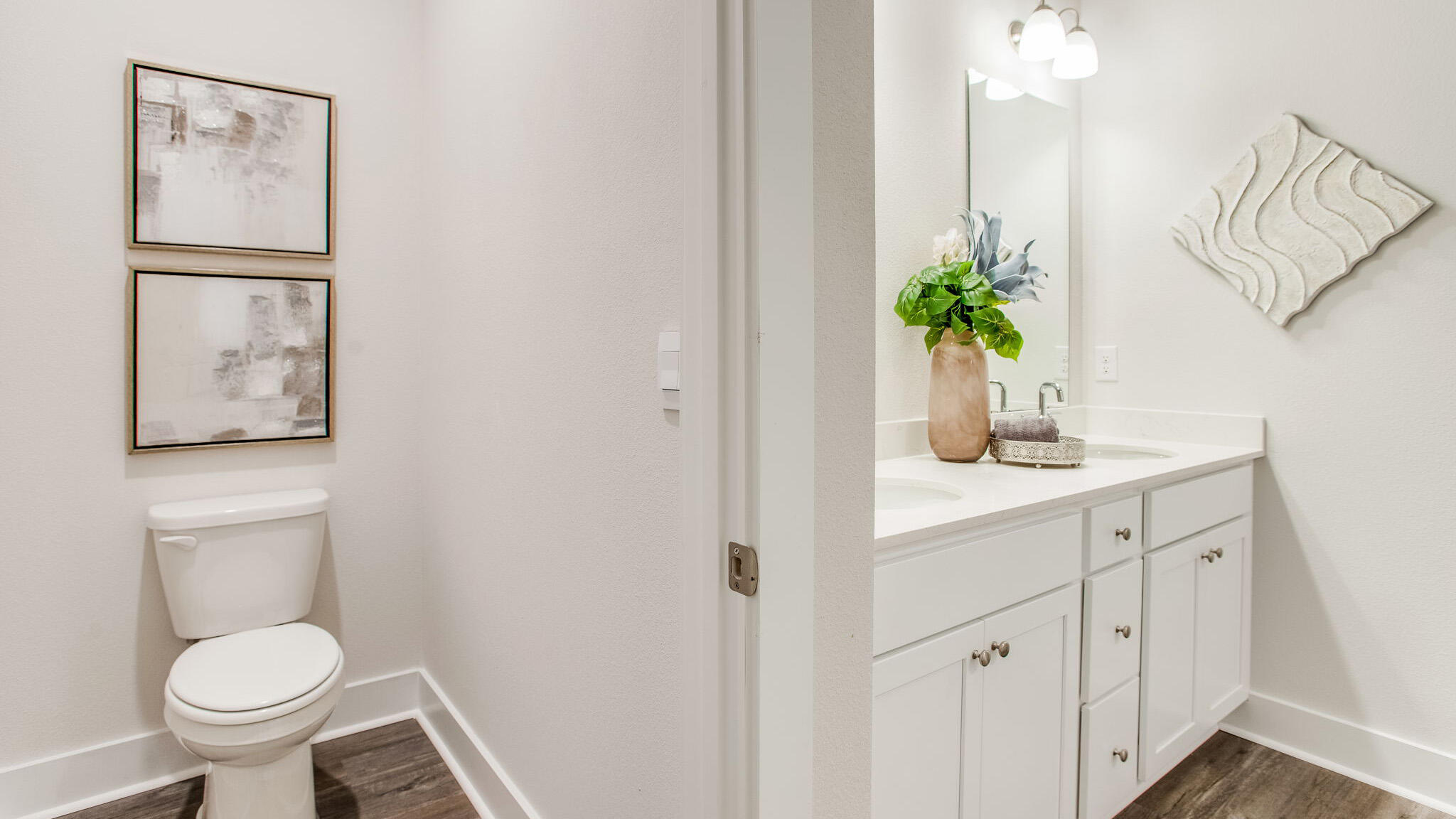 34 Foxtrail Run Freeport, FL 32439 - Photo 20 of 31 a bathroom with a toilet a sink and mirror