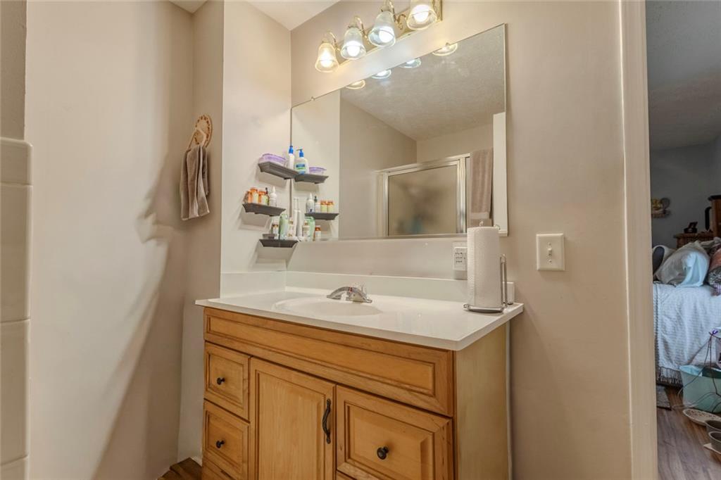 160 Highway 320 Carnesville, GA 30521 - Photo 19 of 68 a bathroom with a sink and a mirror