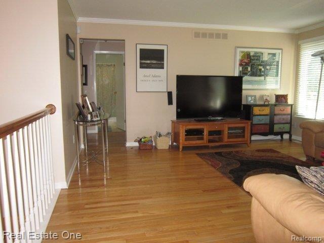 40345 Oak Tree Novi, MI 48375 - Photo 9 of 41 rainling overlooks foyer.JPG
