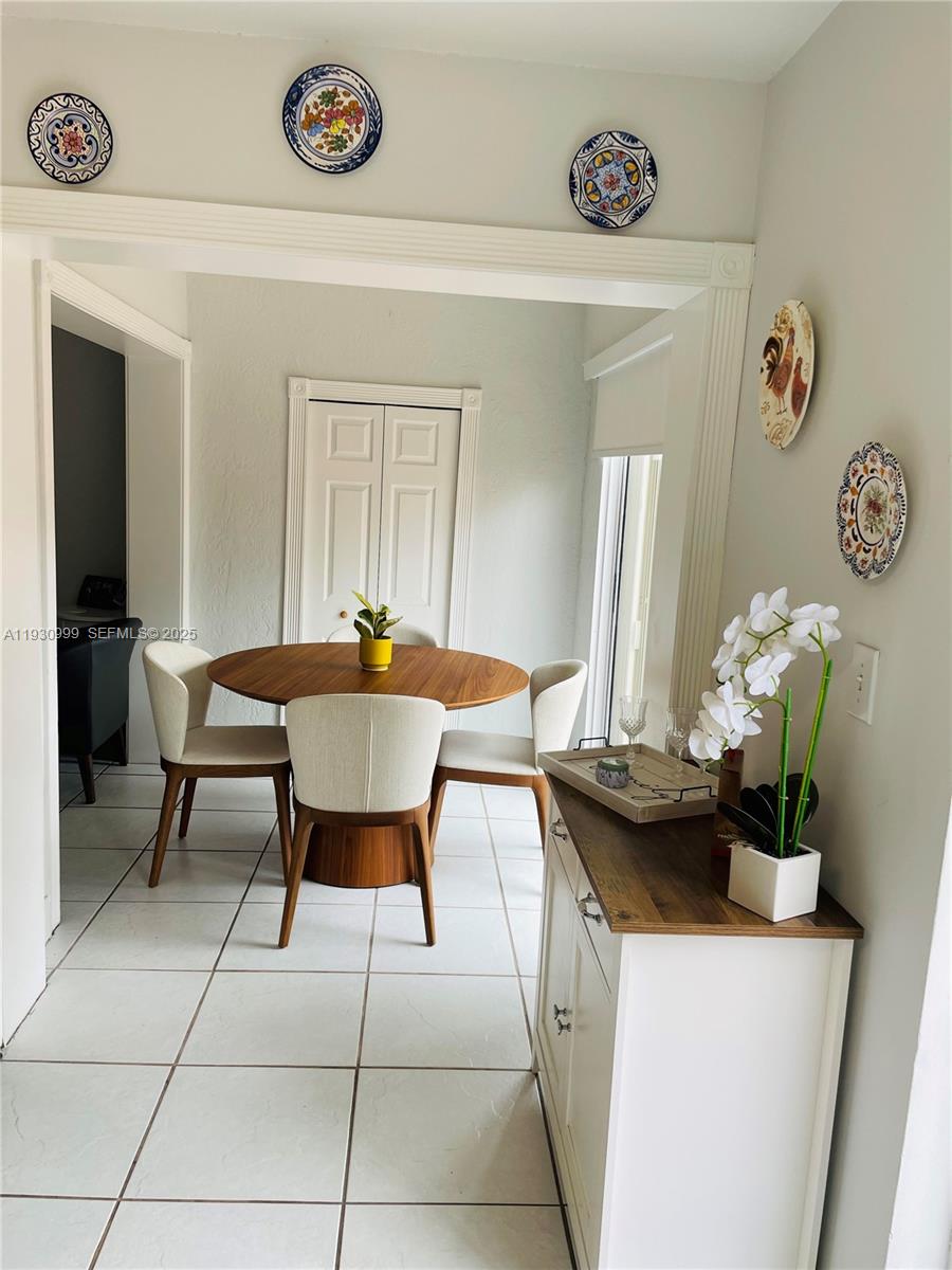 11527 Southwest 90th Terrace Miami, FL 33176 - Photo 16 of 20 a dining room with furniture and window