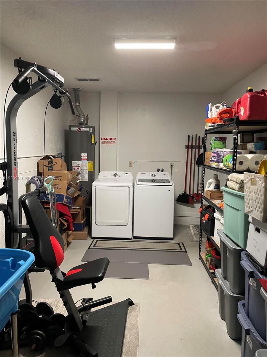 11527 Southwest 90th Terrace Miami, FL 33176 - Photo 17 of 20 a utility room with dryer and washer