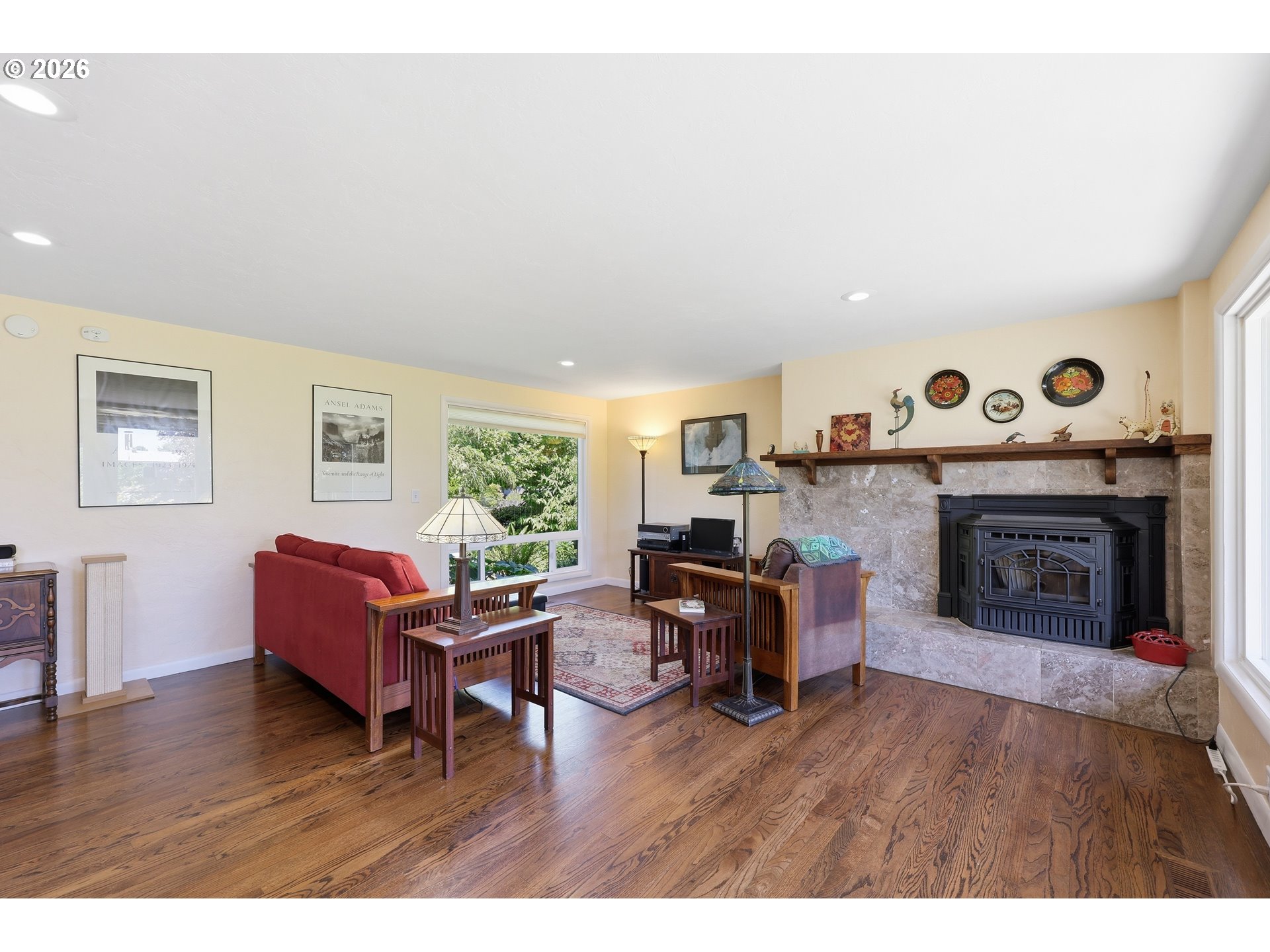 65 Greenvale Drive Springfield, OR 97477 - Photo 5 of 42 a living room with furniture and a fireplace