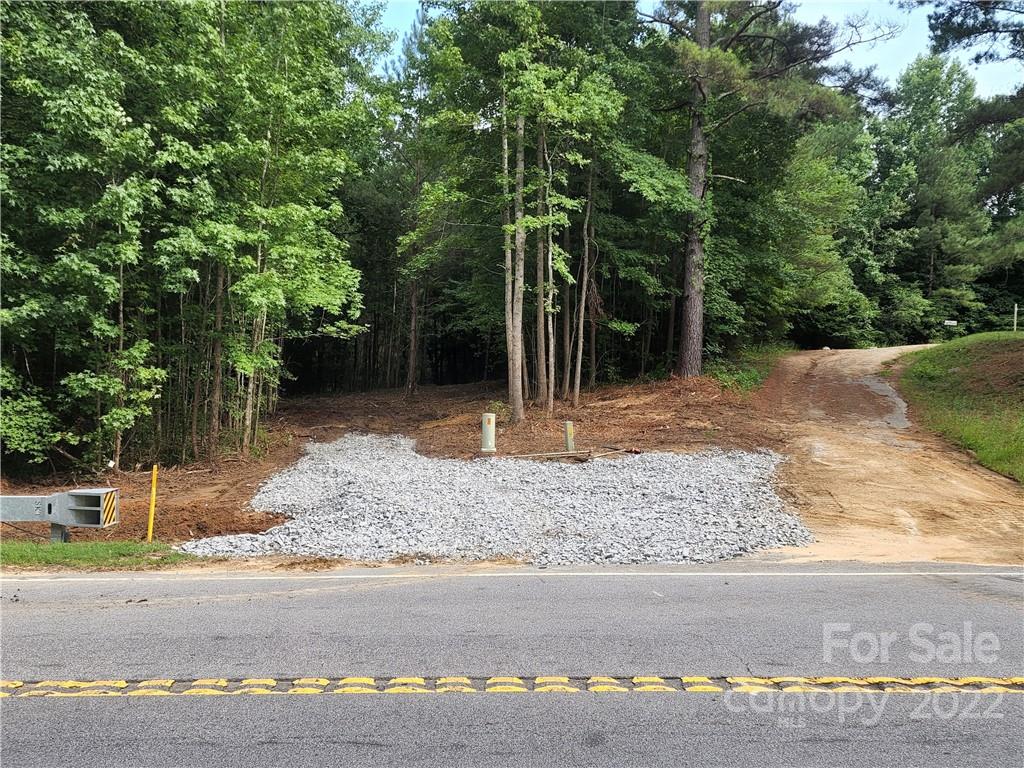 2695 Pinckney Road Chester, SC 29706 - Photo 25 of 44 a backyard of a house with lots of trees