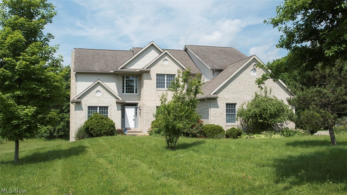 3847 Royal Rock Road Akron, OH 44321 - Photo 1 of 29 Welcome to this fabulous, custom built home situated on 3.68 acres. Combination of brick and vinyl. Side load 4 car garage and additional parking. Beautiful finished walk-out lower level providing additional 1,00 SF of living space, complete with a full kitchen and bath. Great for multi-generational living. A wooded back lot line.