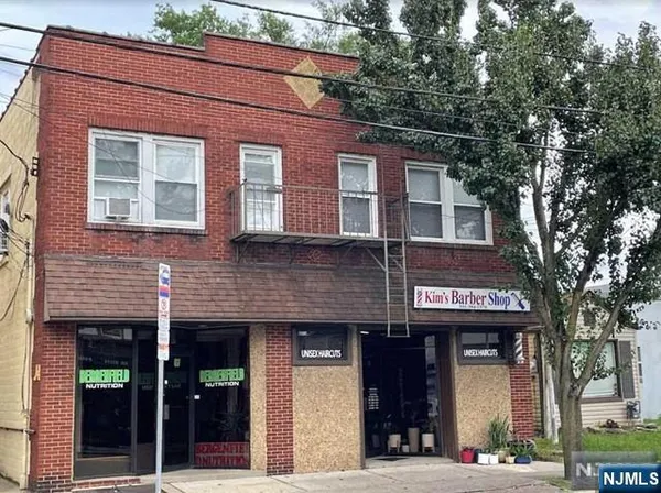 a view of a brick building with a large windows