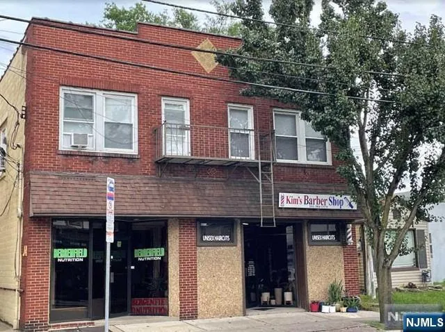 a view of a brick building with a large windows