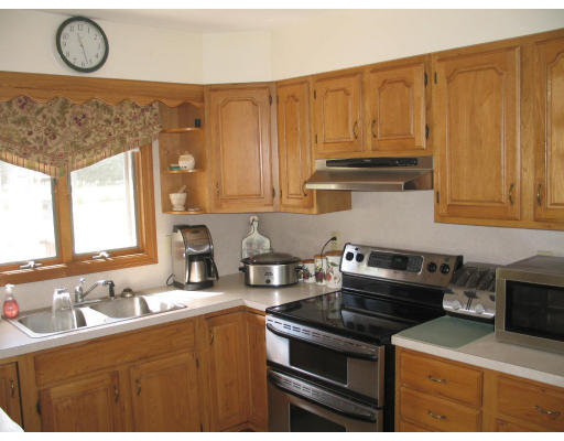 149 Depot Road Hatfield, MA 01038 - Photo 5 of 7 a kitchen with stainless steel appliances granite countertop a stove a sink and a microwave