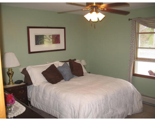 149 Depot Road Hatfield, MA 01038 - Photo 7 of 7 a bedroom with a bed and a window