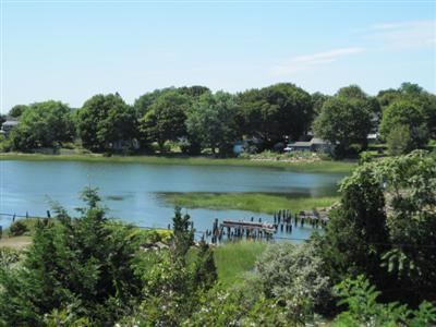 150 Pine Point Road Wellfleet, MA 02667 - Photo 1 of 11 an aerial view of a houses with outdoor space and lake view