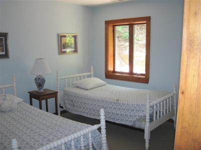 150 Pine Point Road Wellfleet, MA 02667 - Photo 11 of 11 a bedroom with a bed and a window