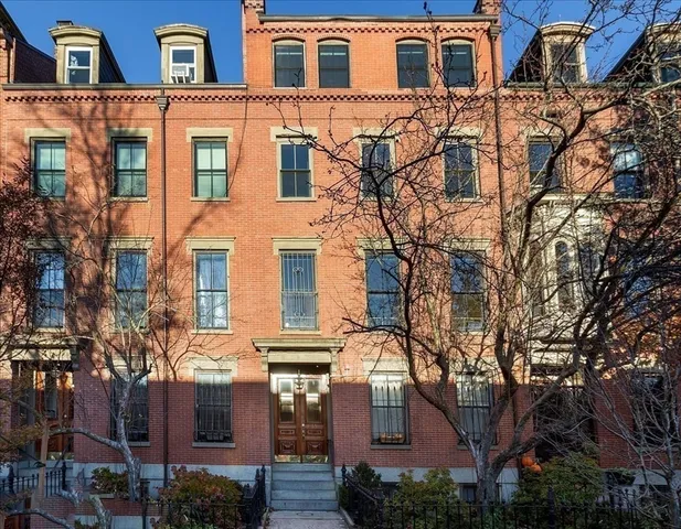 a large building with a tree