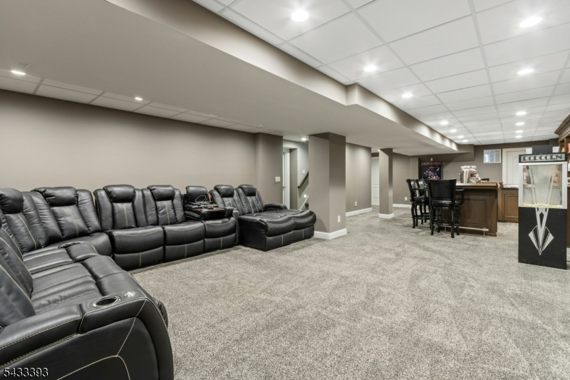 33 Stanton Street Clark, NJ 07066 - Photo 15 of 37 a projector room with furniture
