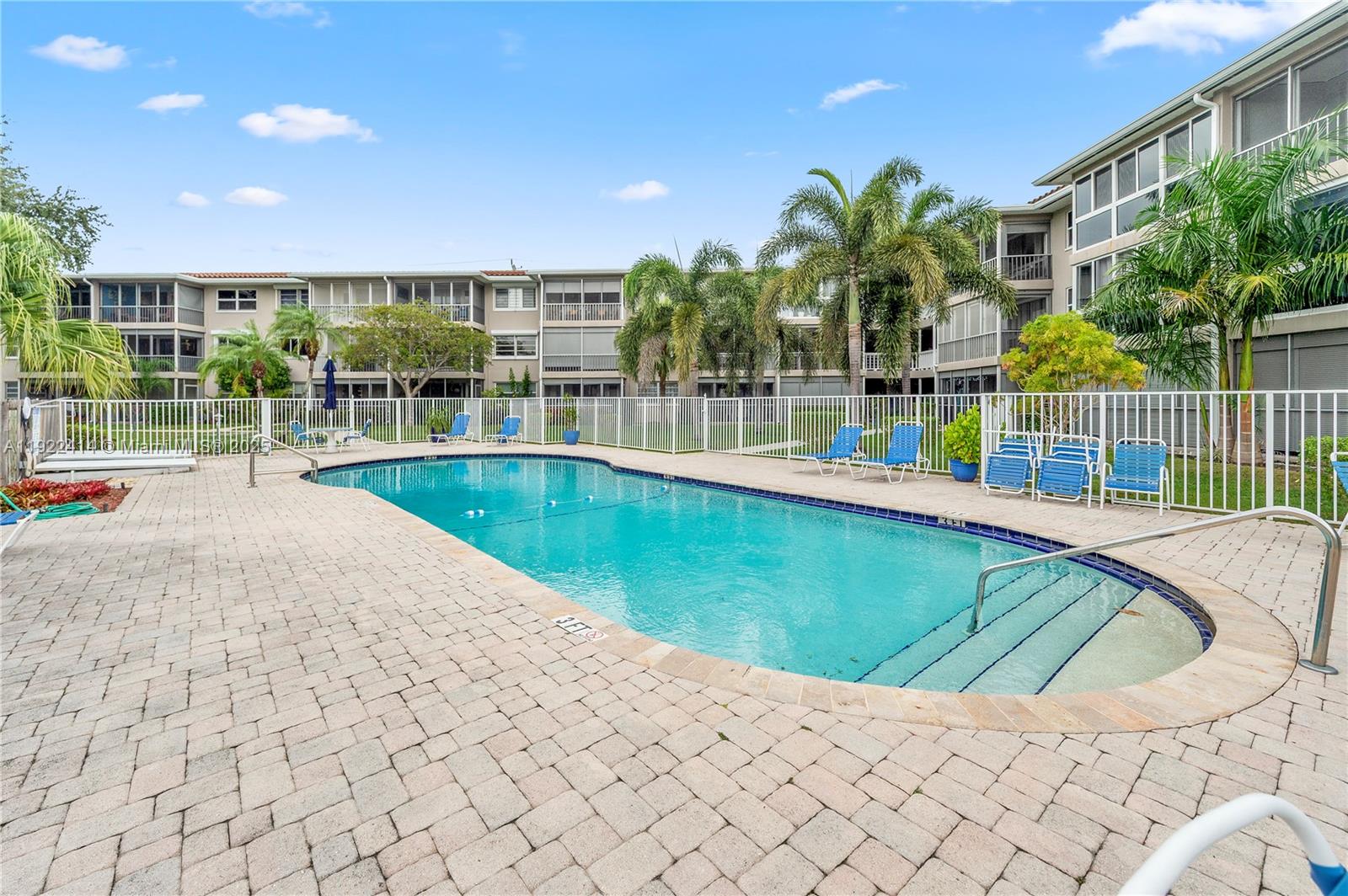 900 Southwest 12th Street, Unit 206 Fort Lauderdale, FL 33315 - Photo 23 of 24 a view of a swimming pool with a patio