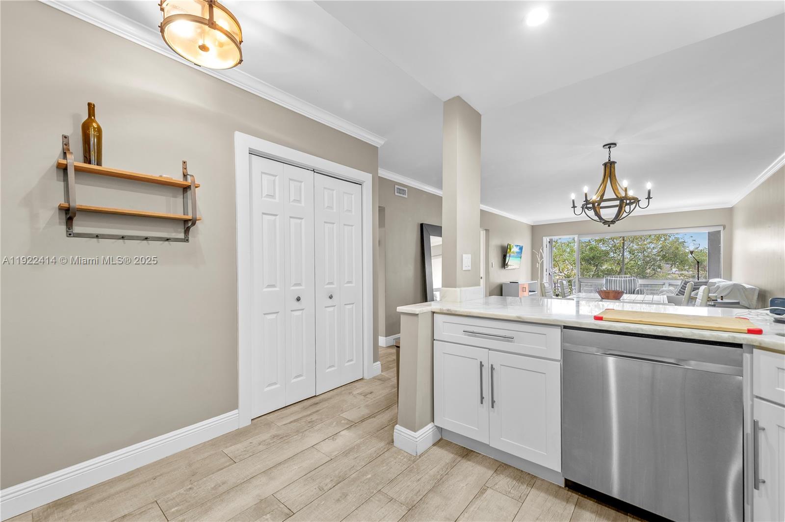900 Southwest 12th Street, Unit 206 Fort Lauderdale, FL 33315 - Photo 4 of 24 a kitchen with a sink and cabinets