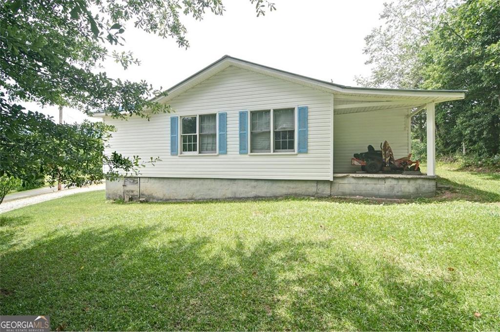 2165 Townsend Mill Road Young Harris, GA 30582 - Photo 3 of 12 front view of house with a yard