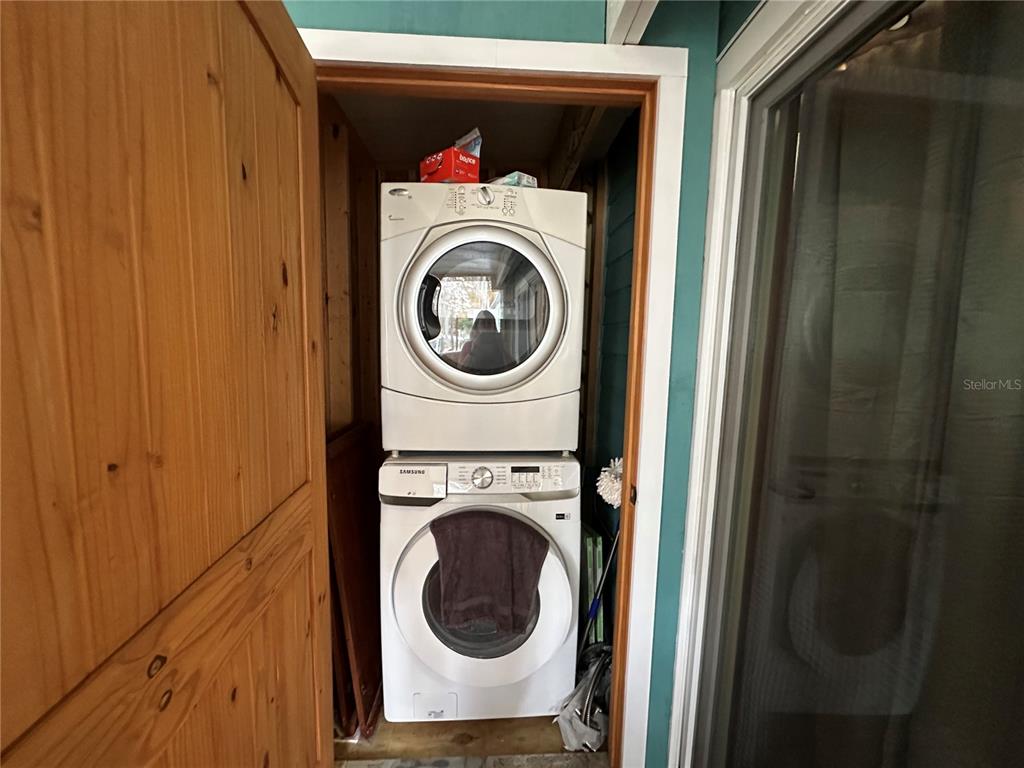 56315 Hickory Road Astor, FL 32102 - Photo 27 of 31 a utility room with dryer and washer