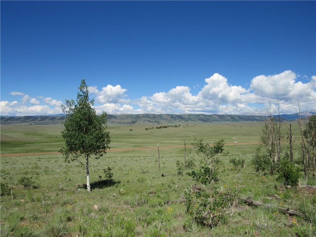 12950 Elkhorn Road Como, CO 80432 - Photo 22 of 30 a view of a lake from a yard