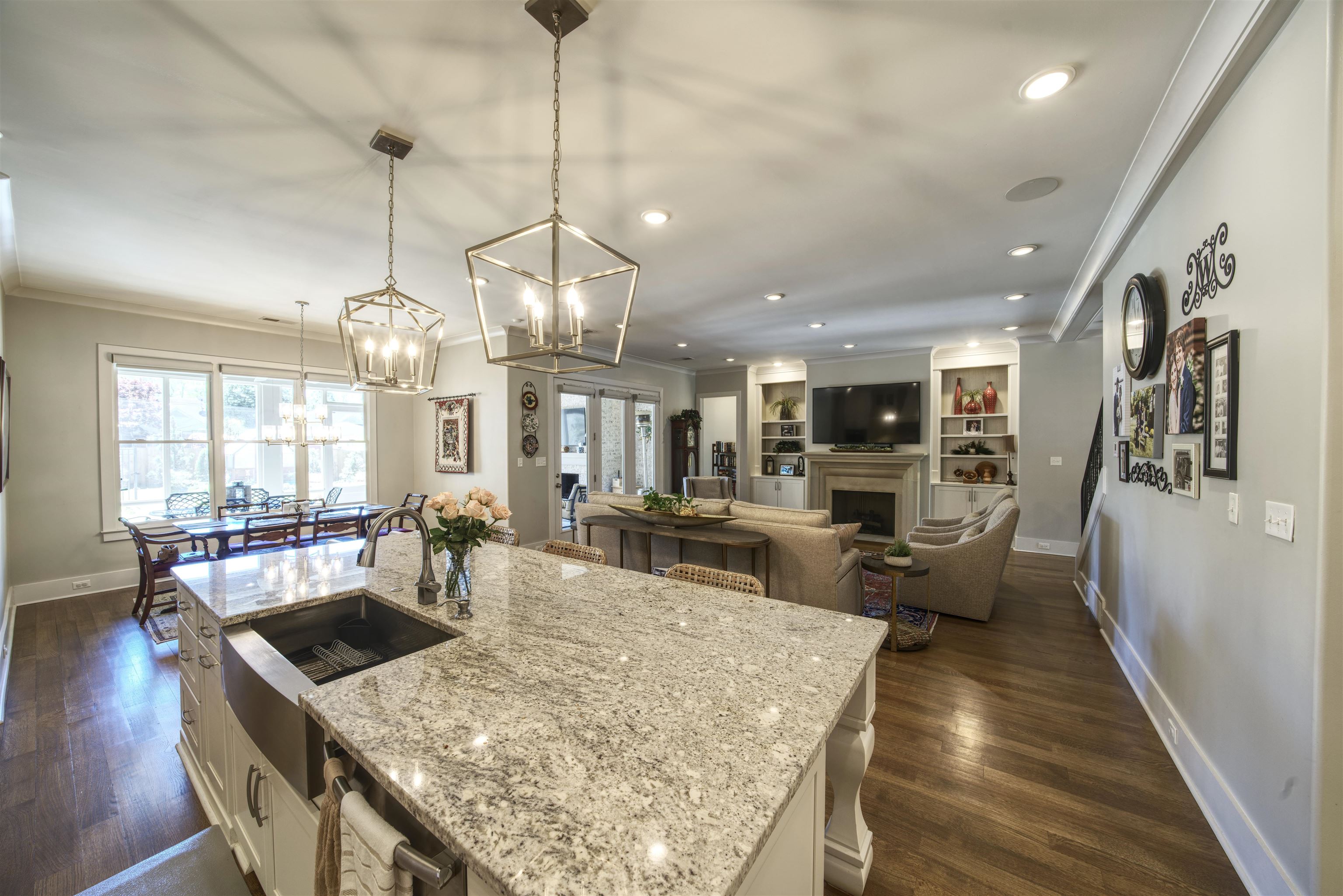 5293 Cole Road Memphis, TN 38120 - Photo 15 of 40 a large kitchen with a table and chairs