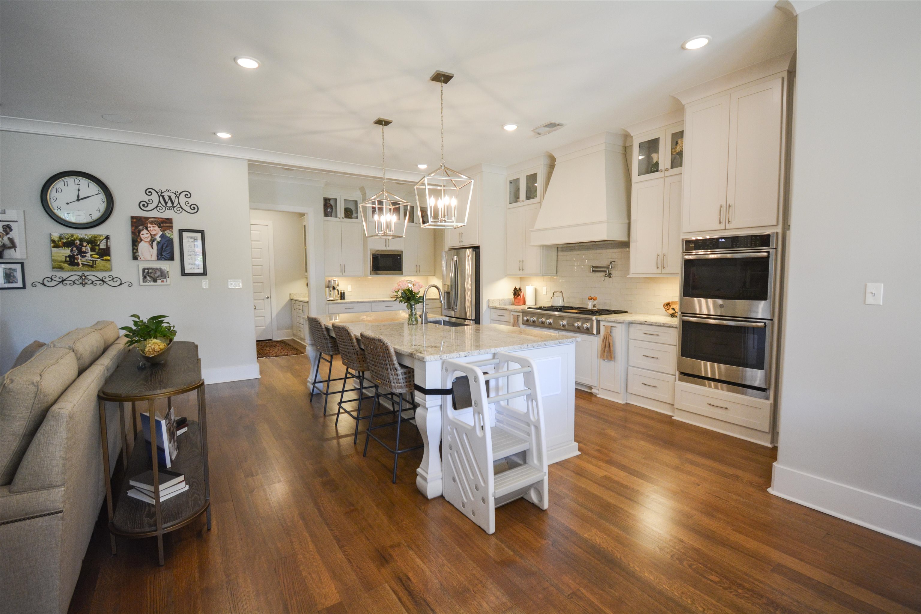 5293 Cole Road Memphis, TN 38120 - Photo 19 of 40 a view of kitchen with cabinets and wooden floor