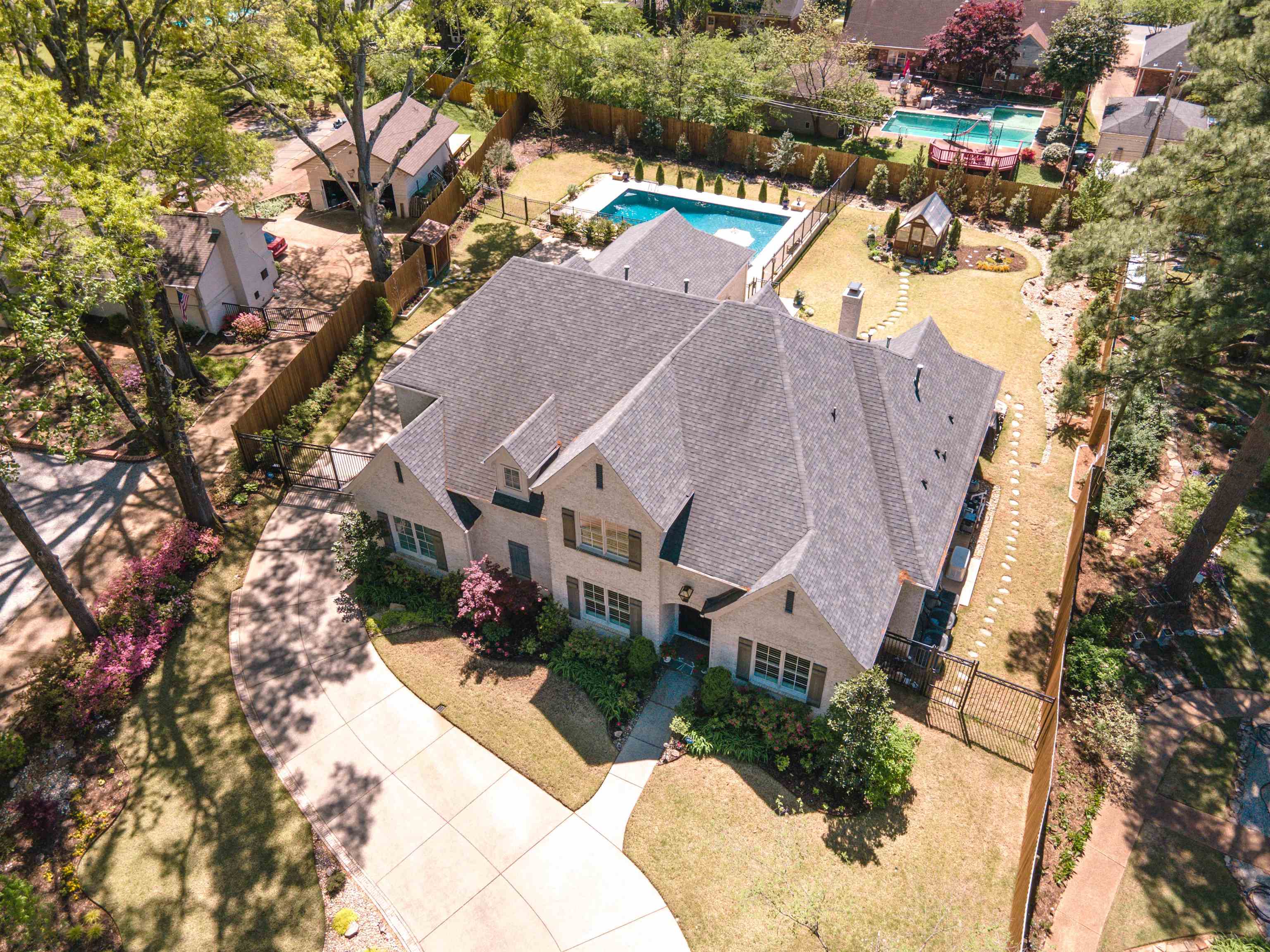 5293 Cole Road Memphis, TN 38120 - Photo 2 of 40 an aerial view of residential houses with outdoor space