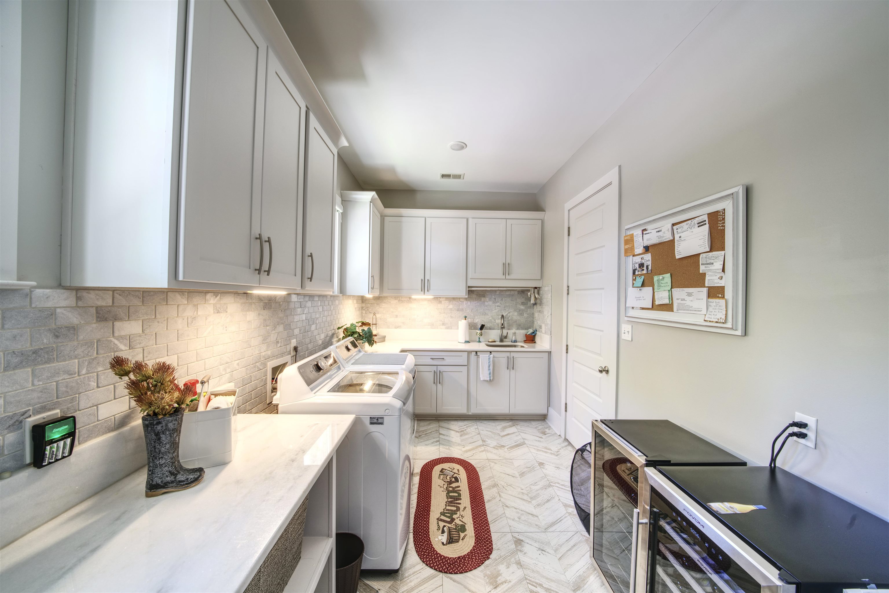 5293 Cole Road Memphis, TN 38120 - Photo 24 of 40 a kitchen with granite countertop a sink a stove and cabinets