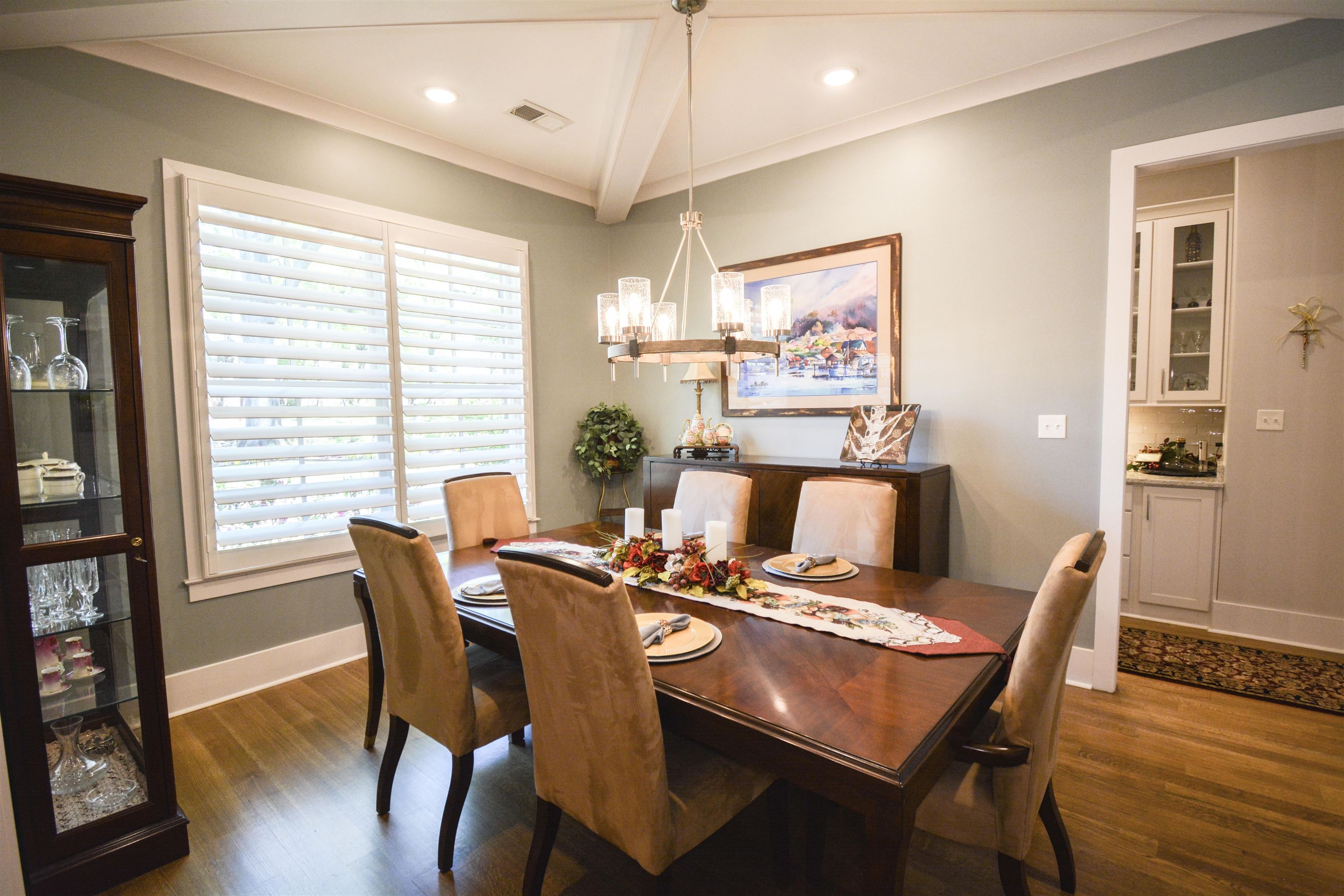 5293 Cole Road Memphis, TN 38120 - Photo 36 of 40 a view of a dining room with furniture window and wooden floor