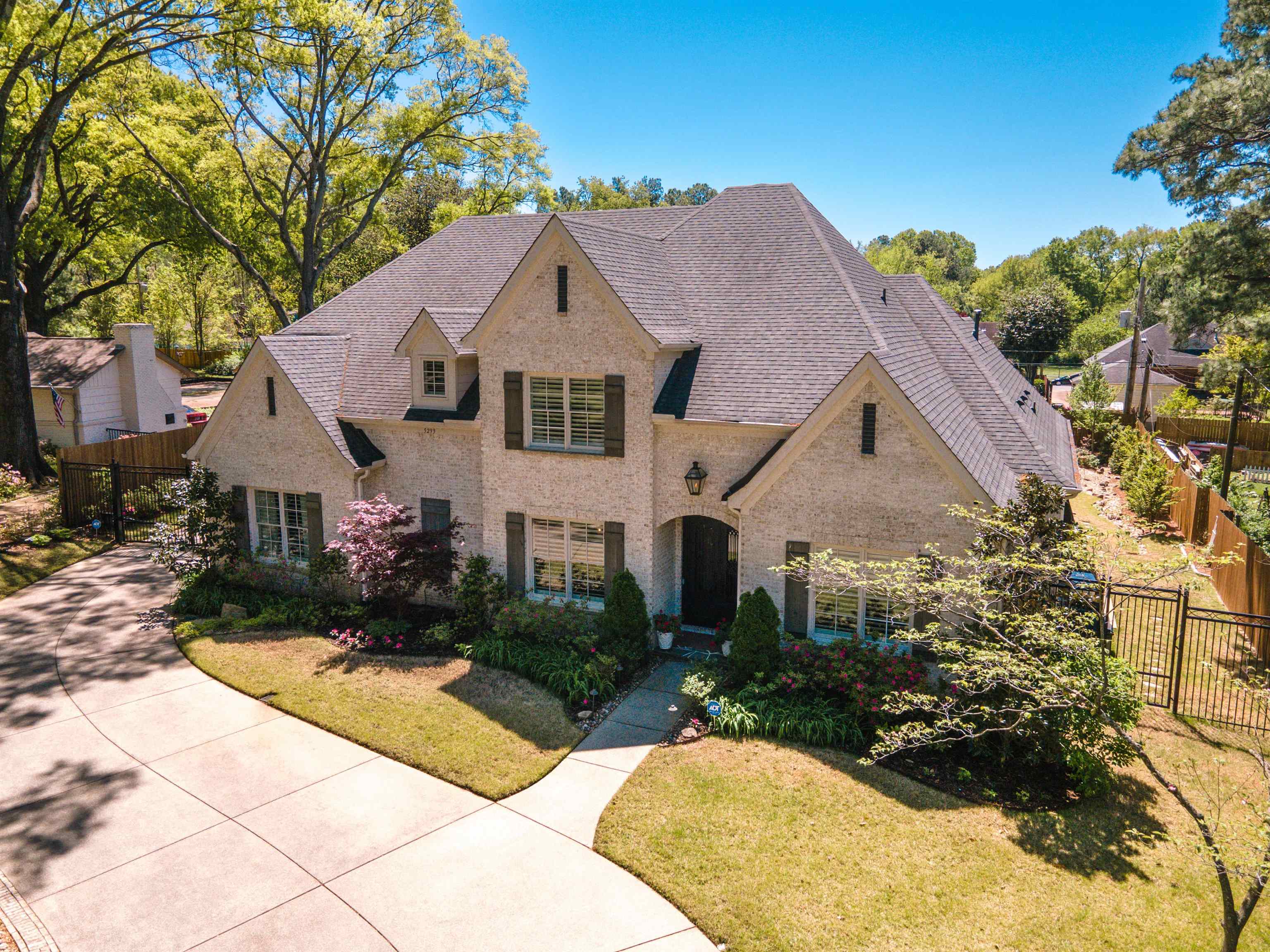 5293 Cole Road Memphis, TN 38120 - Photo 4 of 40 a front view of a house with a yard
