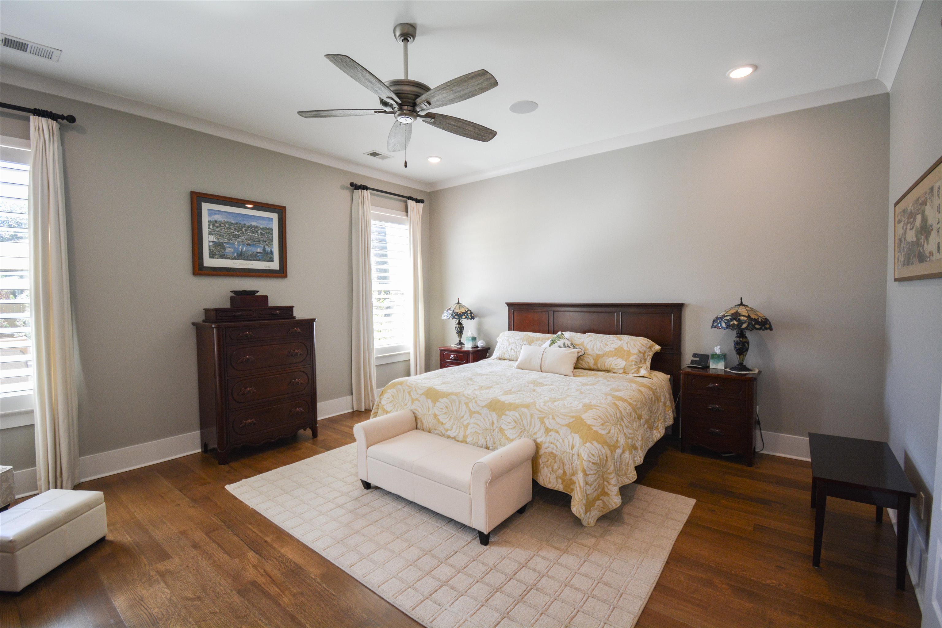 5293 Cole Road Memphis, TN 38120 - Photo 8 of 40 a bedroom with a bed and wooden floor