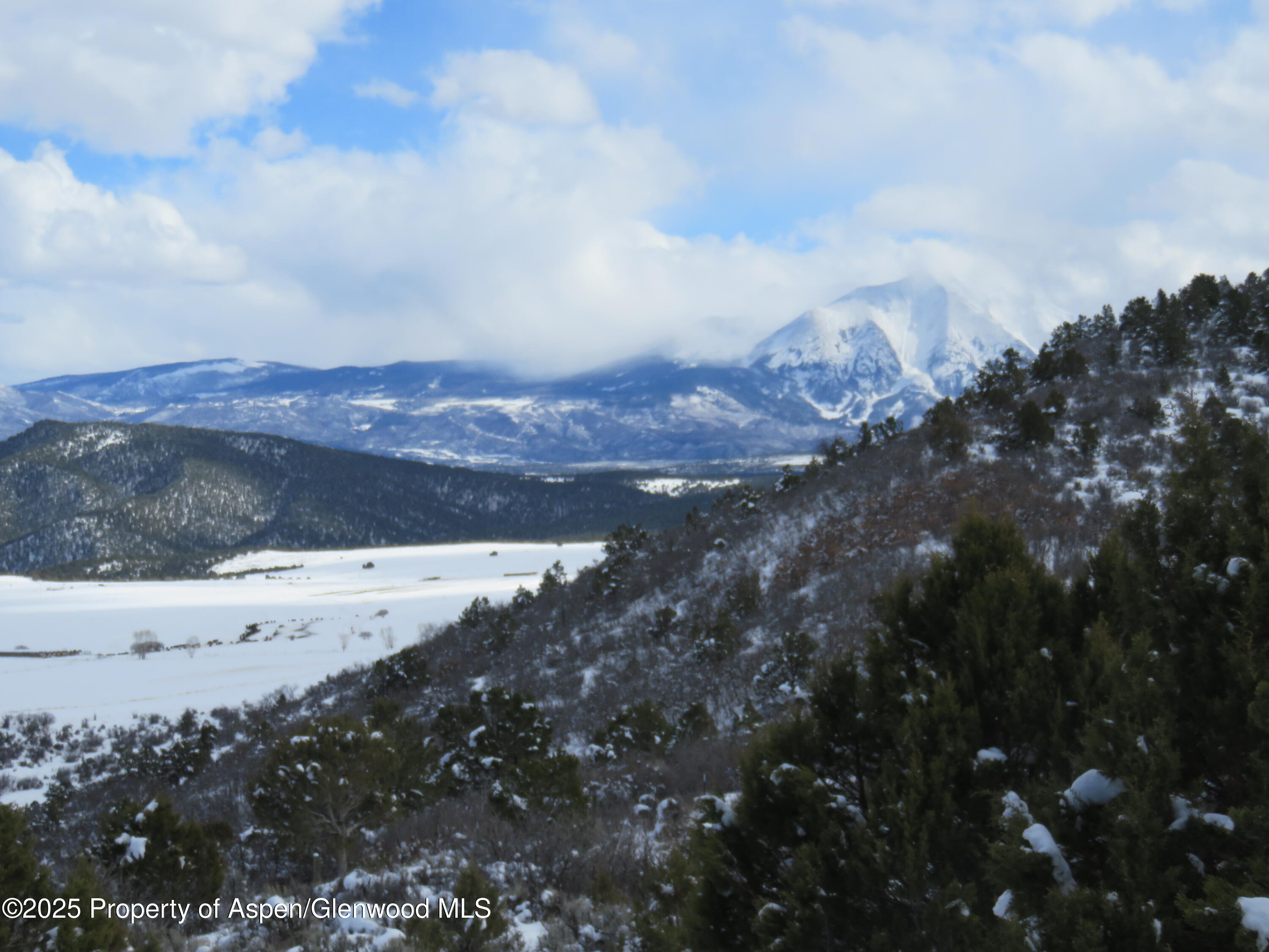 a view of outside space and mountain
