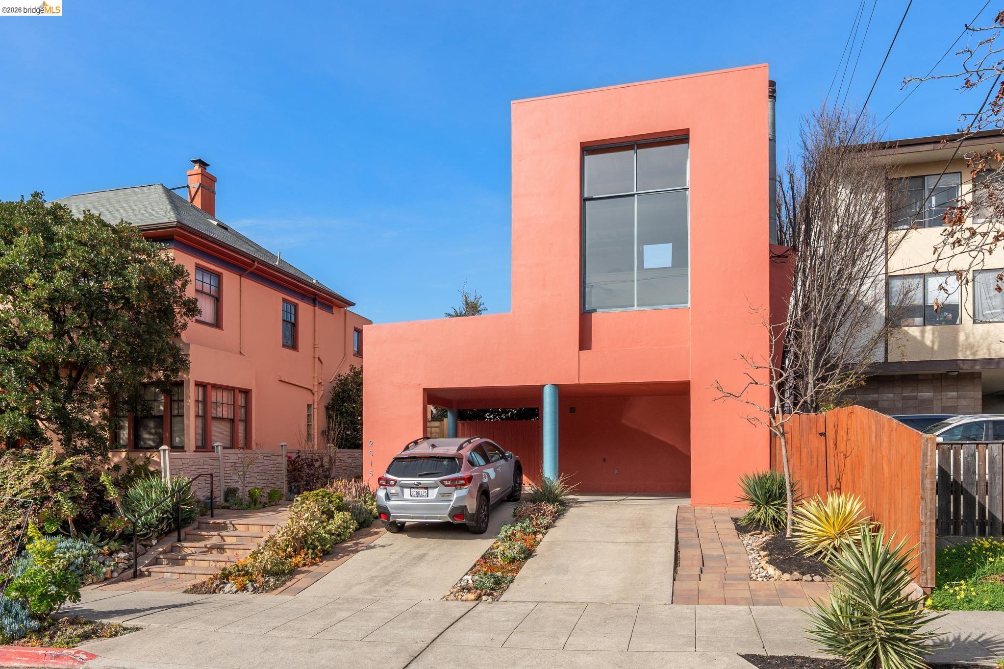 2015 Delaware Street Berkeley, CA 94709 - Photo 2 of 60 View of front of home with stucco siding and a carport