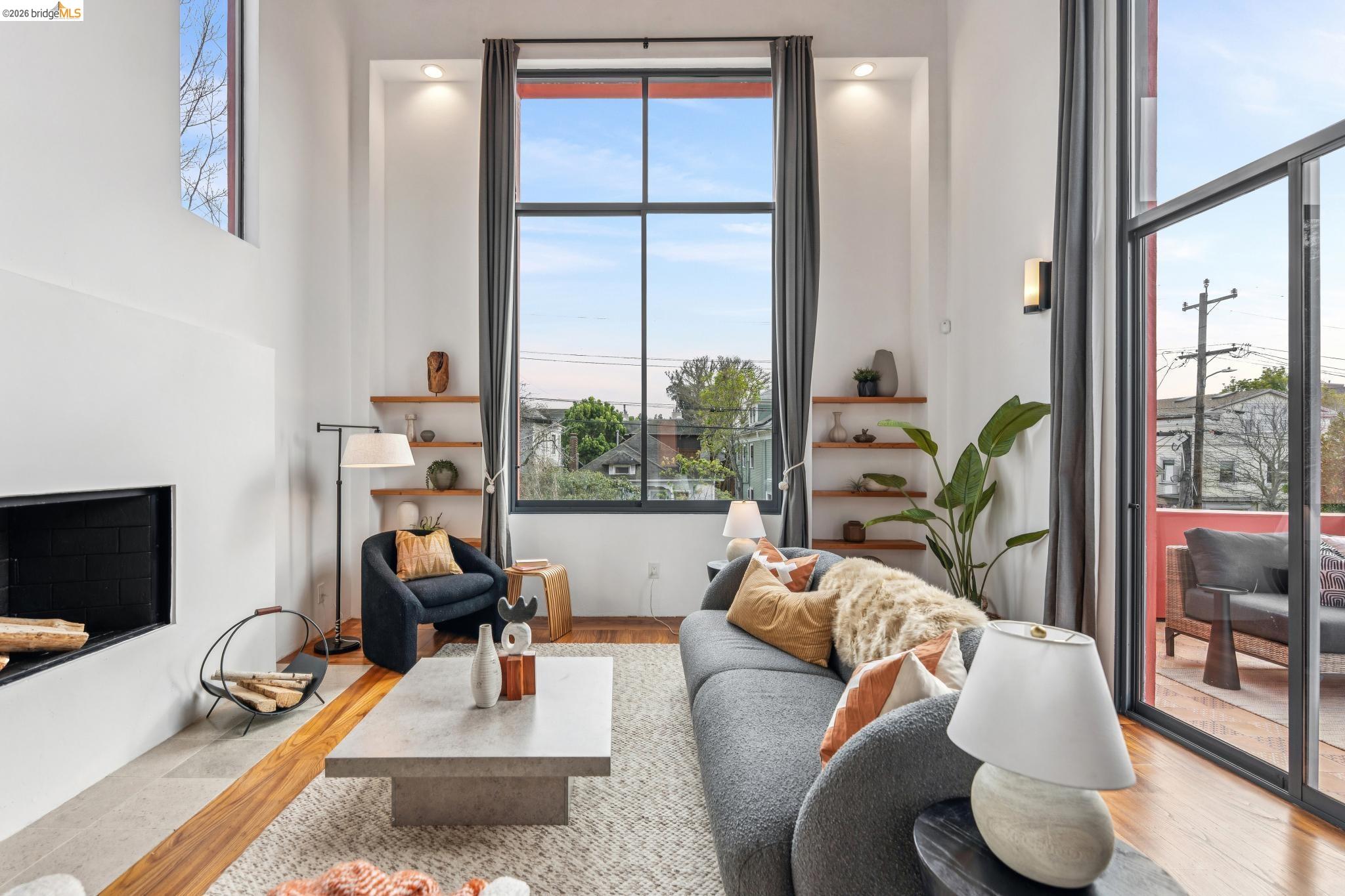 2015 Delaware Street Berkeley, CA 94709 - Photo 27 of 60 Living room featuring a fireplace and wood finished floors