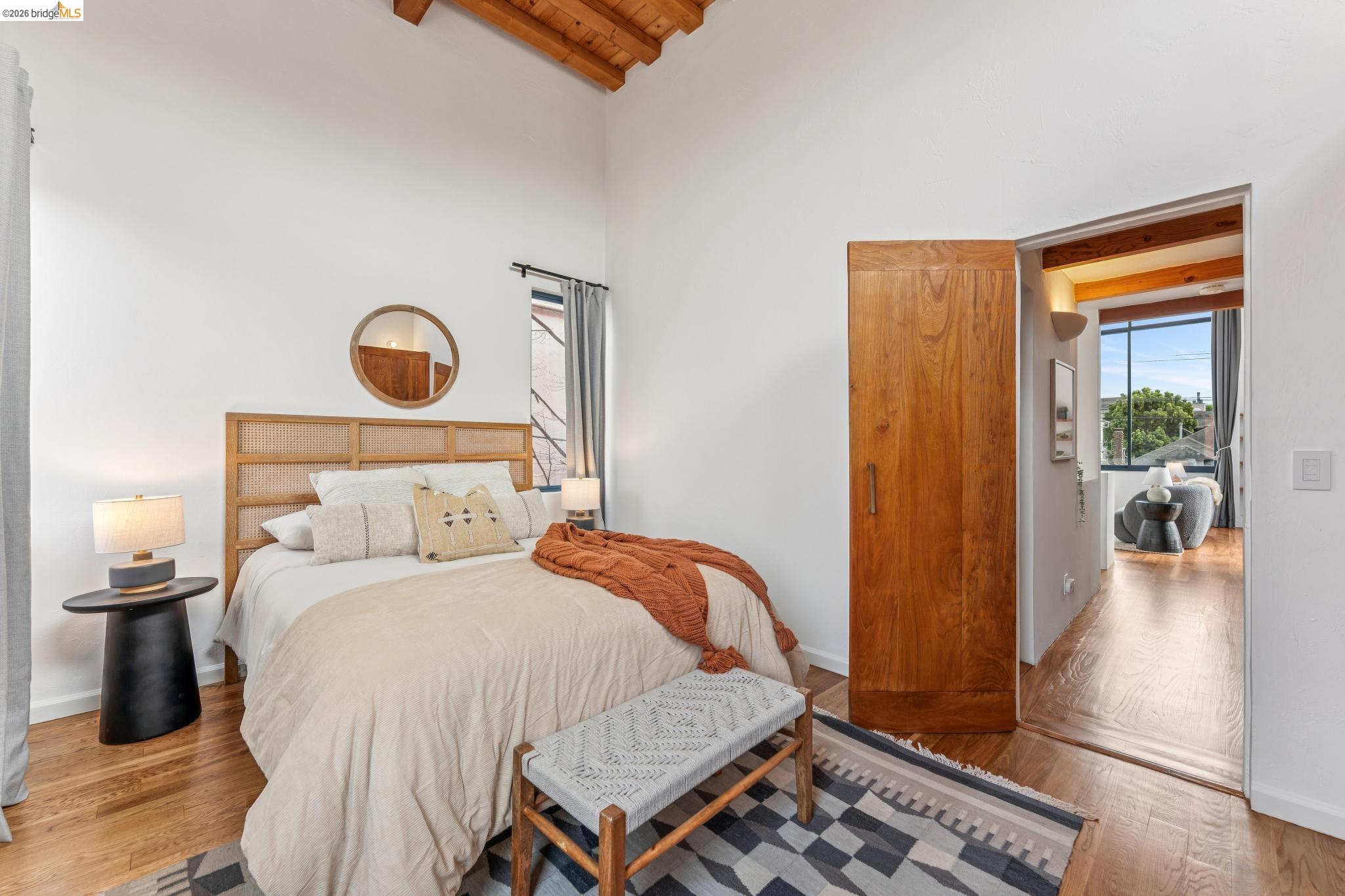 2015 Delaware Street Berkeley, CA 94709 - Photo 42 of 60 Bedroom with wood finished floors and a high wooden beamed ceiling