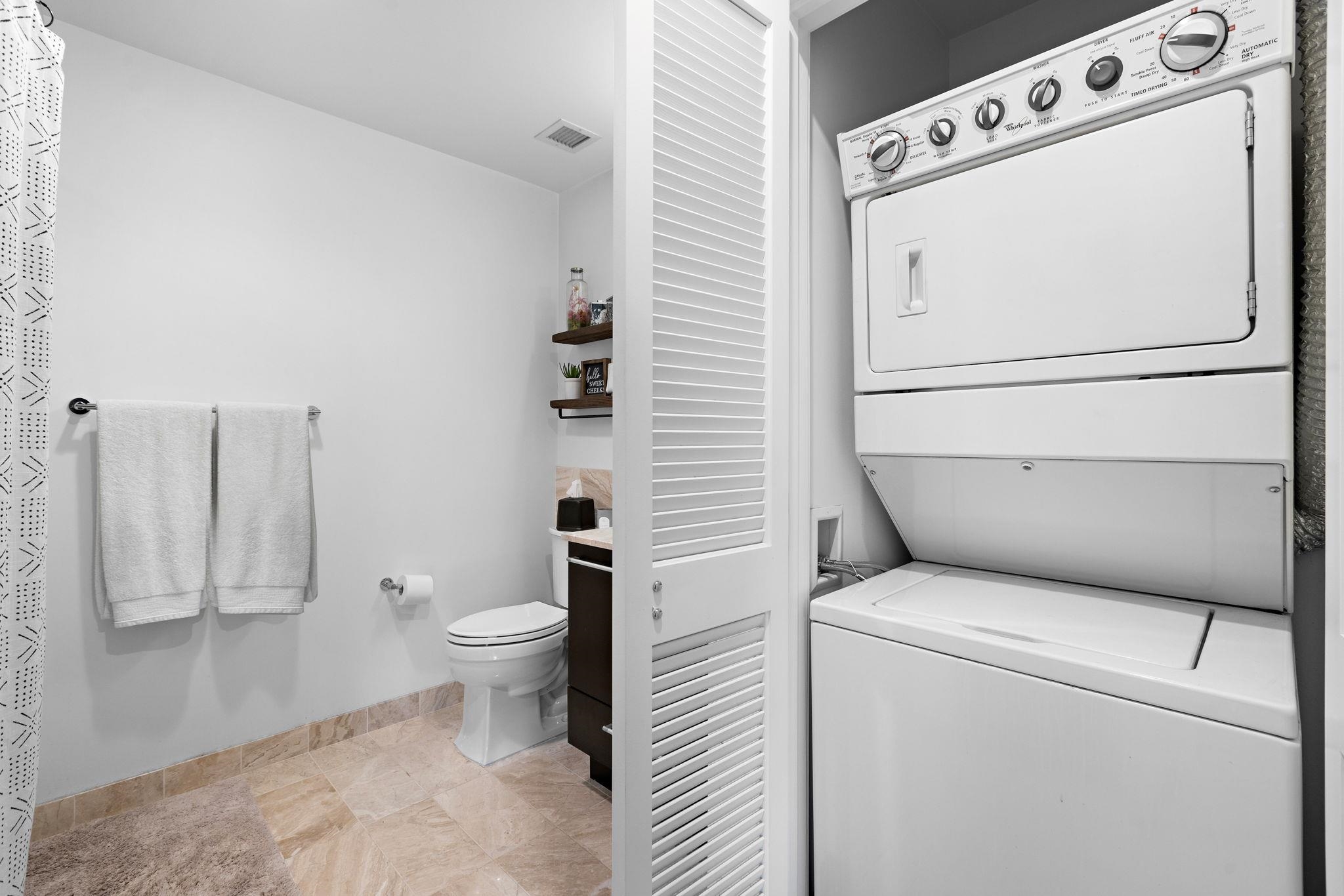 1450 Washington Street, Unit 609 Hoboken, NJ 07030 - Photo 11 of 30 a view of bathroom with a washer and dryer