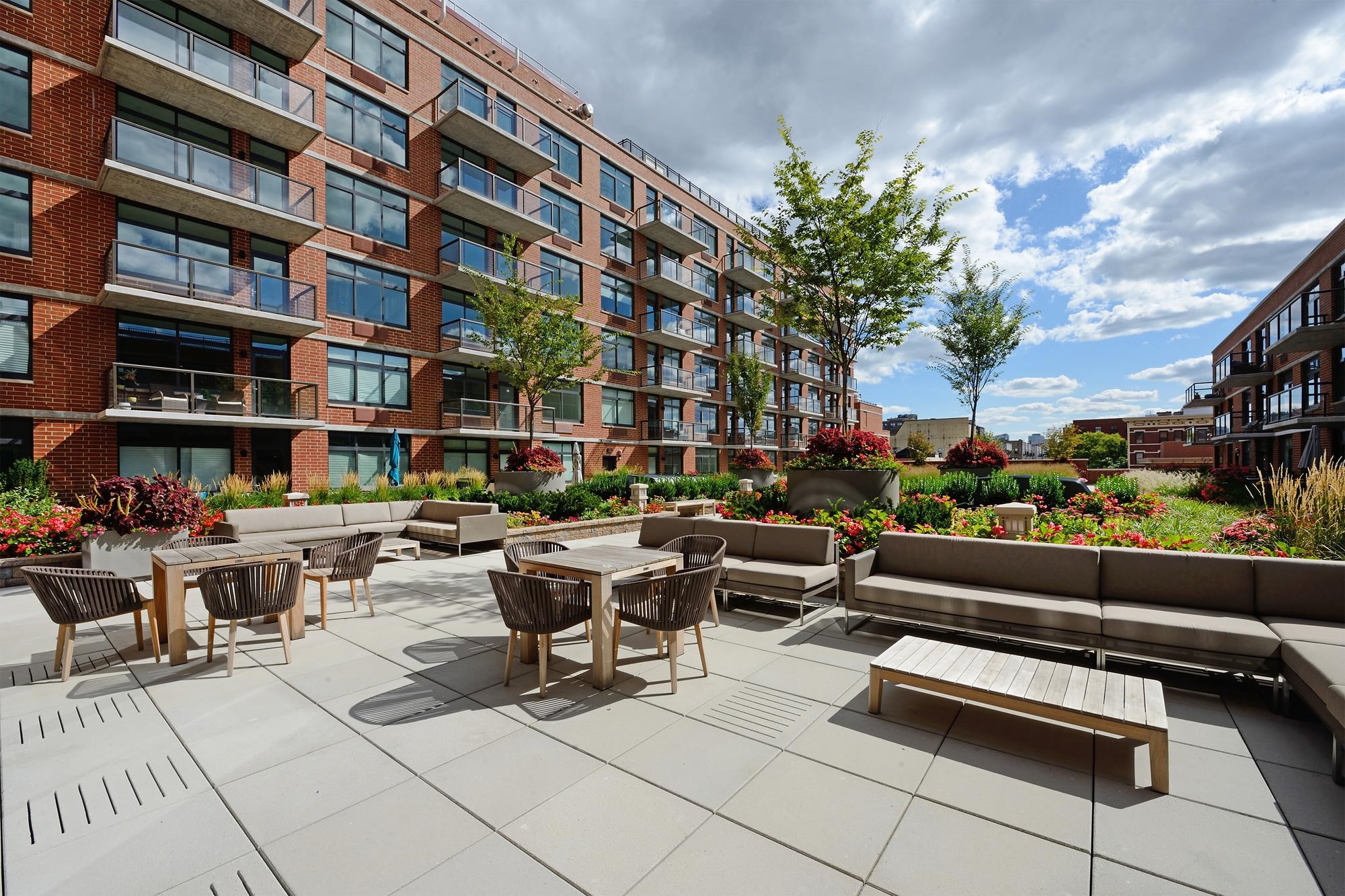 1450 Washington Street, Unit 609 Hoboken, NJ 07030 - Photo 15 of 30 a view of a terrace with sitting area