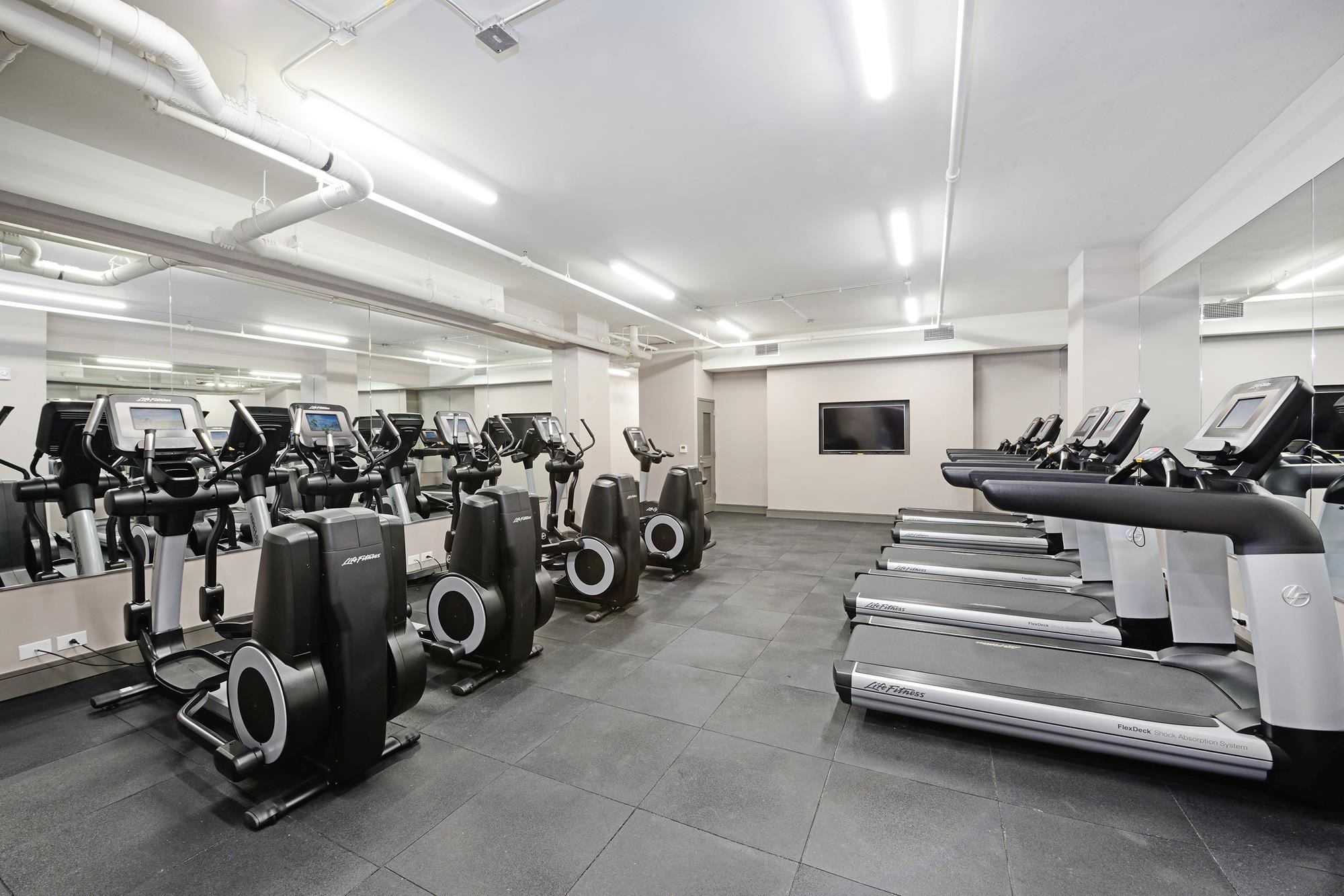 1450 Washington Street, Unit 609 Hoboken, NJ 07030 - Photo 17 of 30 a view of a room with gym equipment