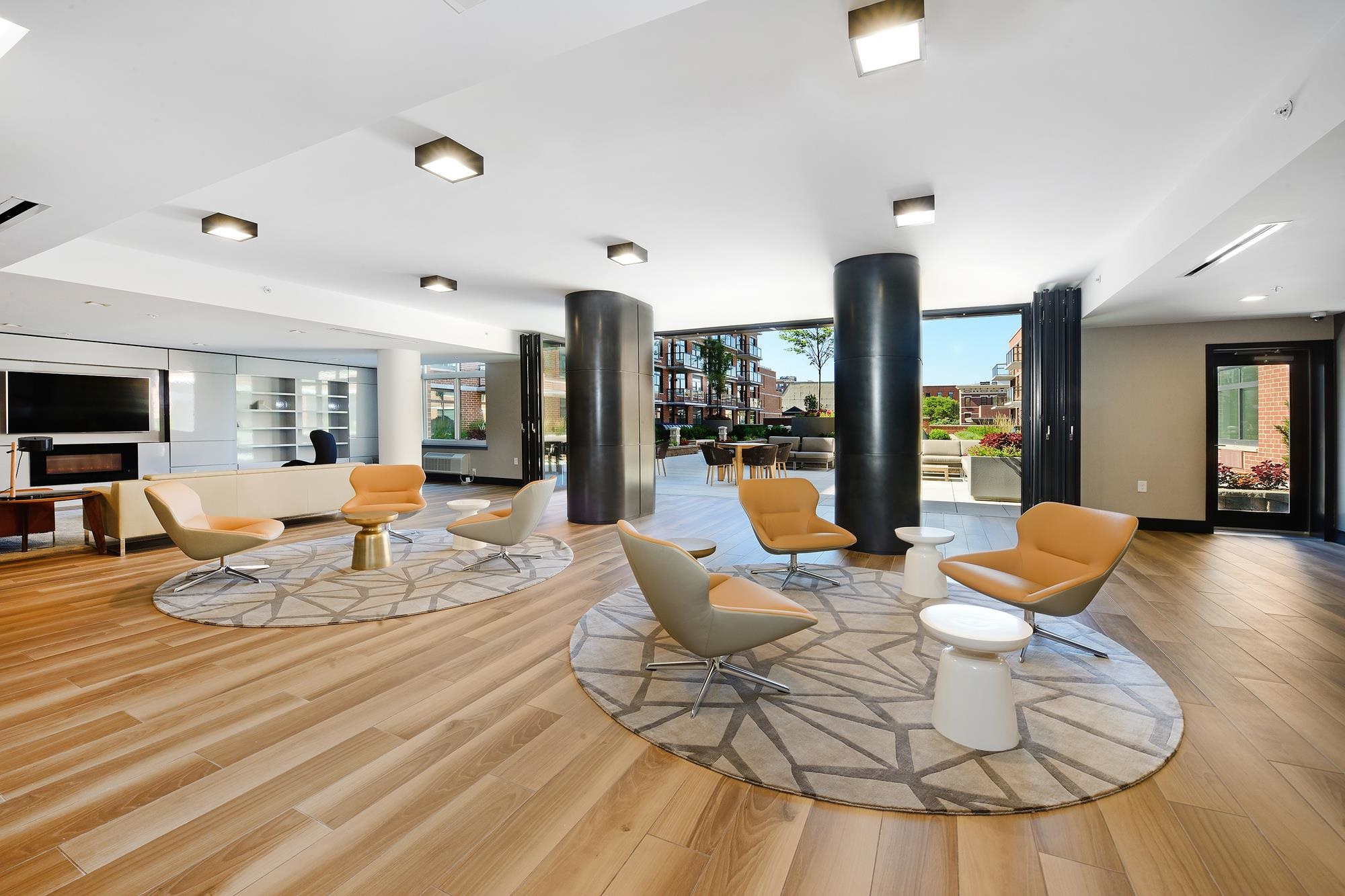 1450 Washington Street, Unit 609 Hoboken, NJ 07030 - Photo 21 of 30 a living room with kitchen countertops and kitchen view