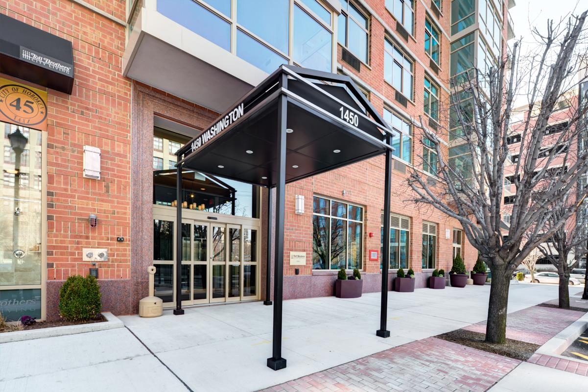 1450 Washington Street, Unit 609 Hoboken, NJ 07030 - Photo 29 of 30 a view of a building with a tree