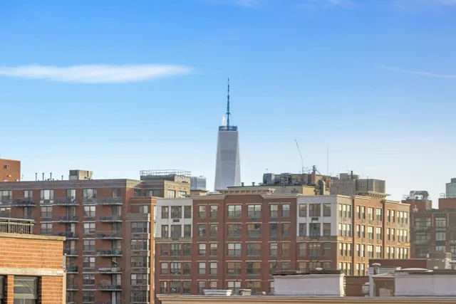 a view of a city that has tall buildings