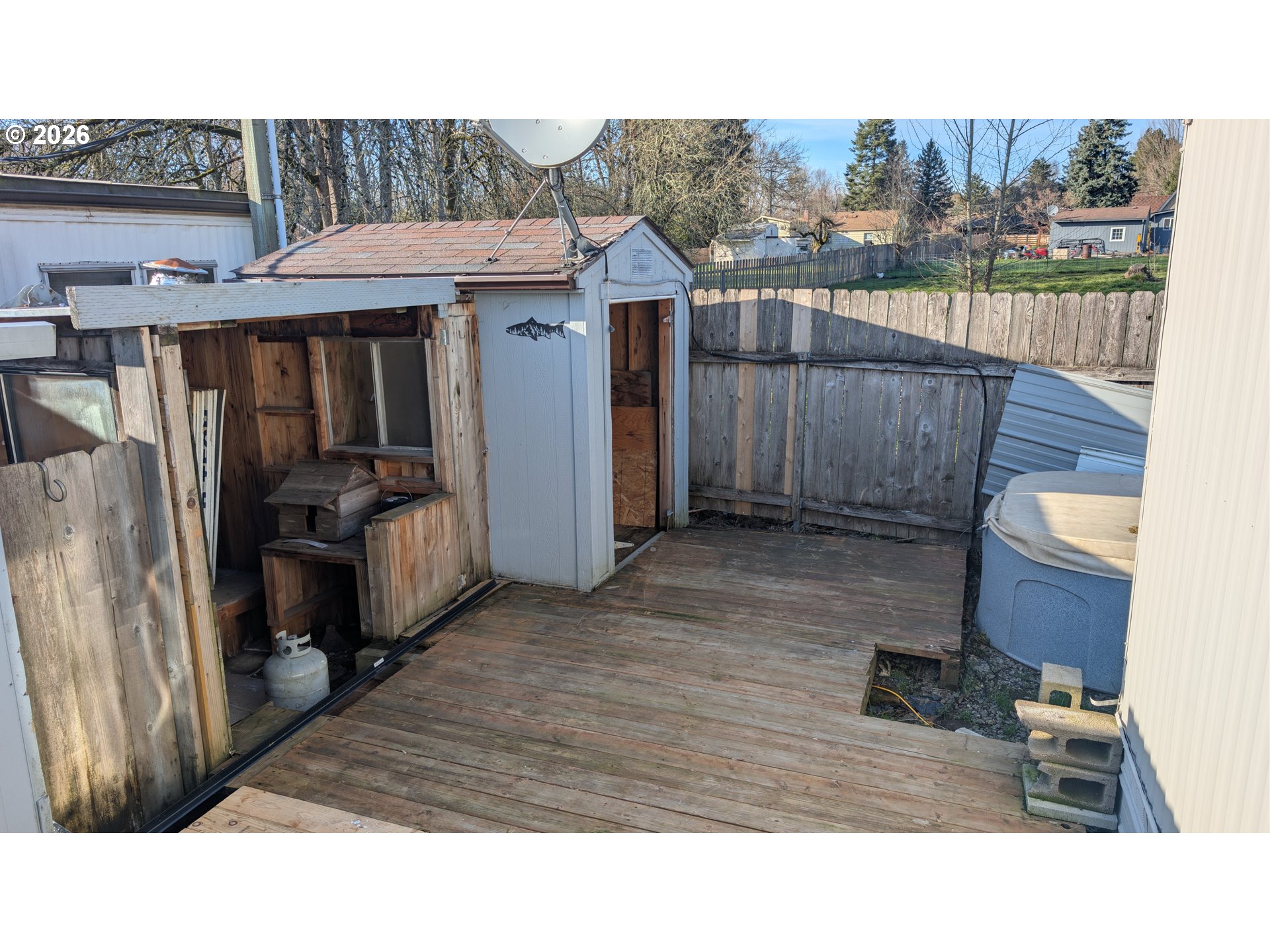 3203 Southeast Vineyard Road, Unit 12 Milwaukie, OR 97267 - Photo 16 of 20 a balcony with furniture and a potted plant