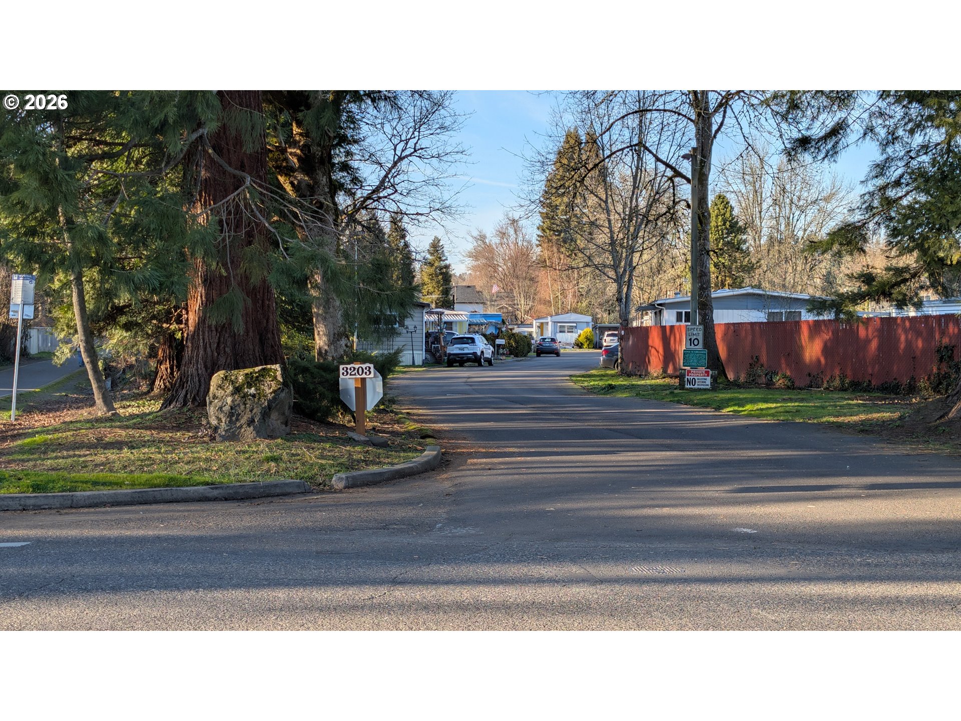 3203 Southeast Vineyard Road, Unit 12 Milwaukie, OR 97267 - Photo 18 of 20 a picture of a yard and front of a house