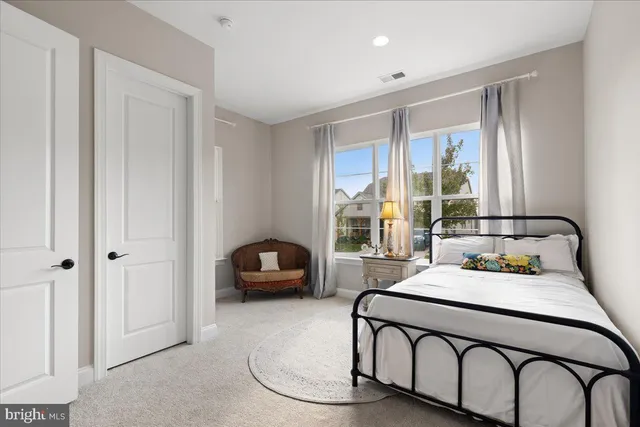 a kitchen with granite countertop stainless steel appliances stove and cabinets