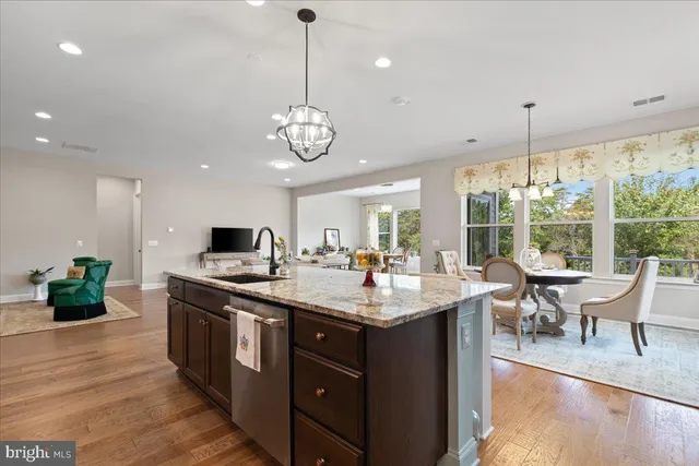 a view of a kitchen counter space with furniture