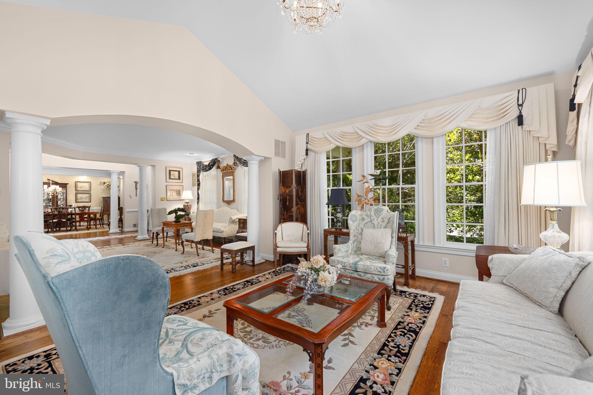 897 Chinquapin Road McLean, VA 22102 - Photo 11 of 66 a living room with furniture a table and a large window