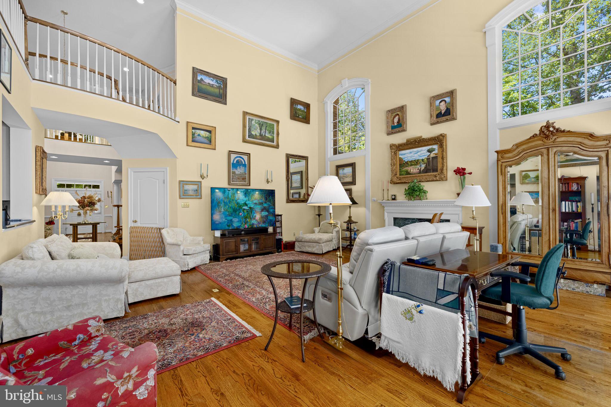 897 Chinquapin Road McLean, VA 22102 - Photo 18 of 66 a living room with furniture windows and wooden floor