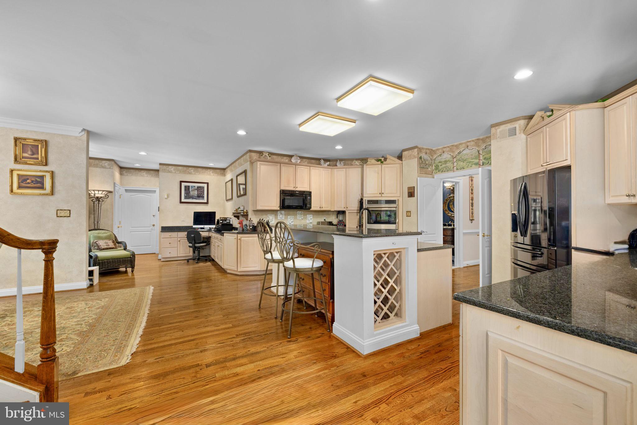 897 Chinquapin Road McLean, VA 22102 - Photo 25 of 66 a large kitchen with lots of counter space and stainless steel appliances